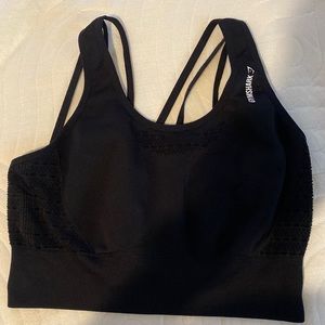 Black Gymshark crop top size large. Only worn a few times. Smoke free home